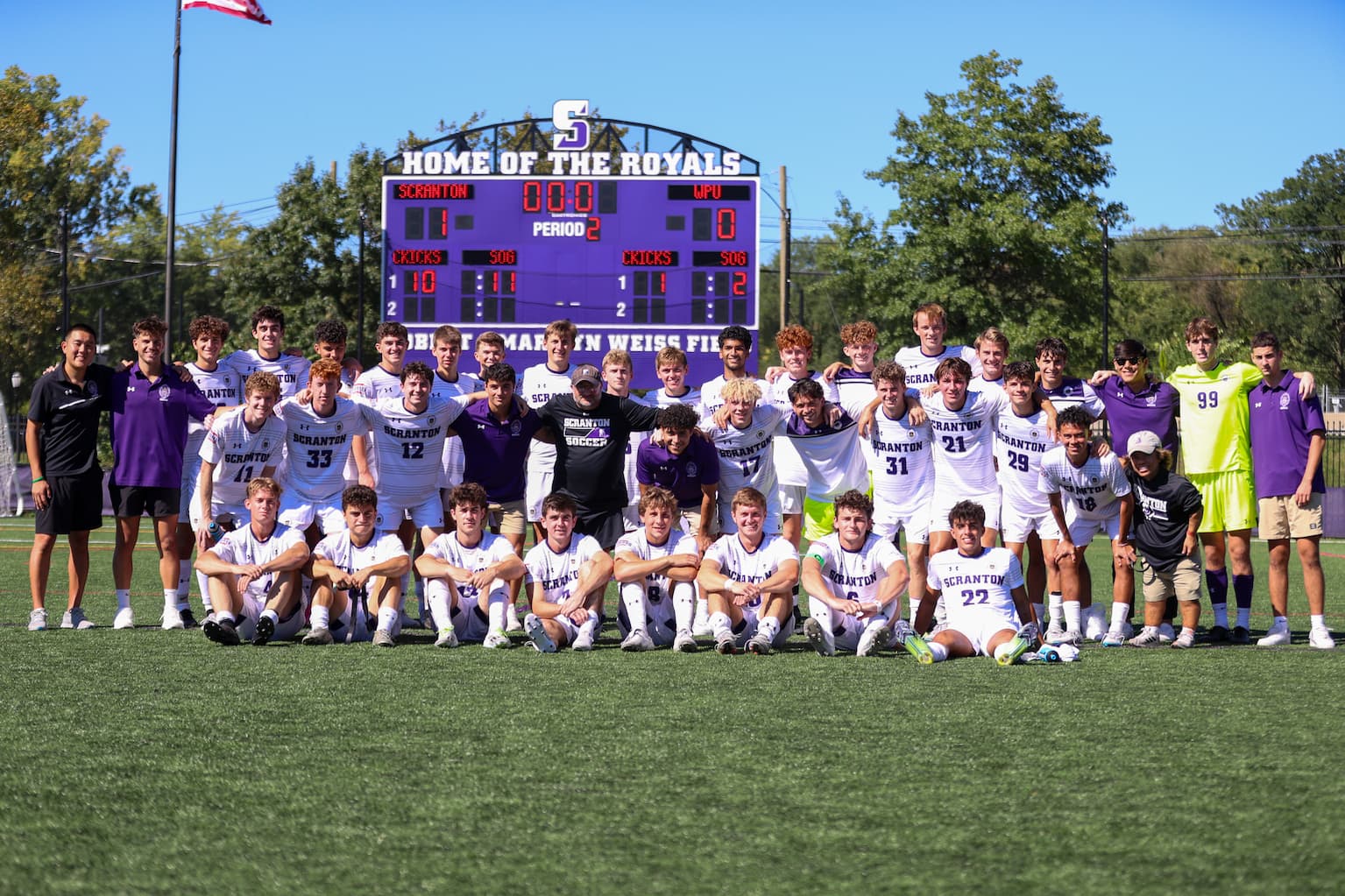 Head coach Jamie Spangler, shown at far right, who notched his 200th career victory in the fall with a 3-1 win over DeSales is shown with The University of Scranton volleyball team.