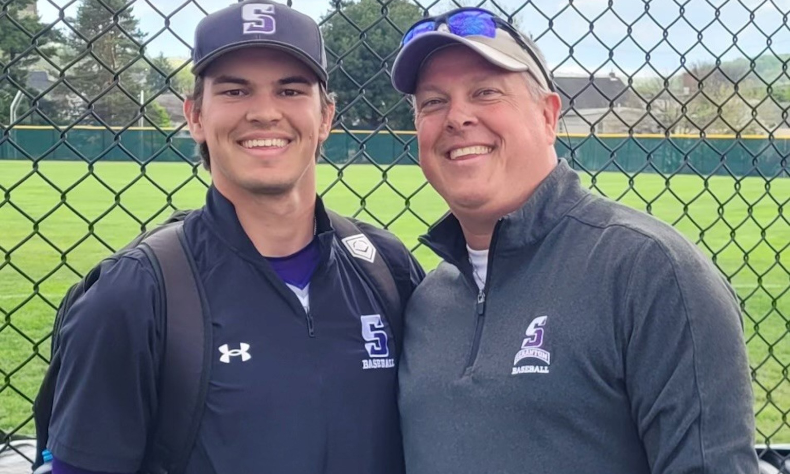 Aidan Rumain ‘26 with his father, Brian ’94.