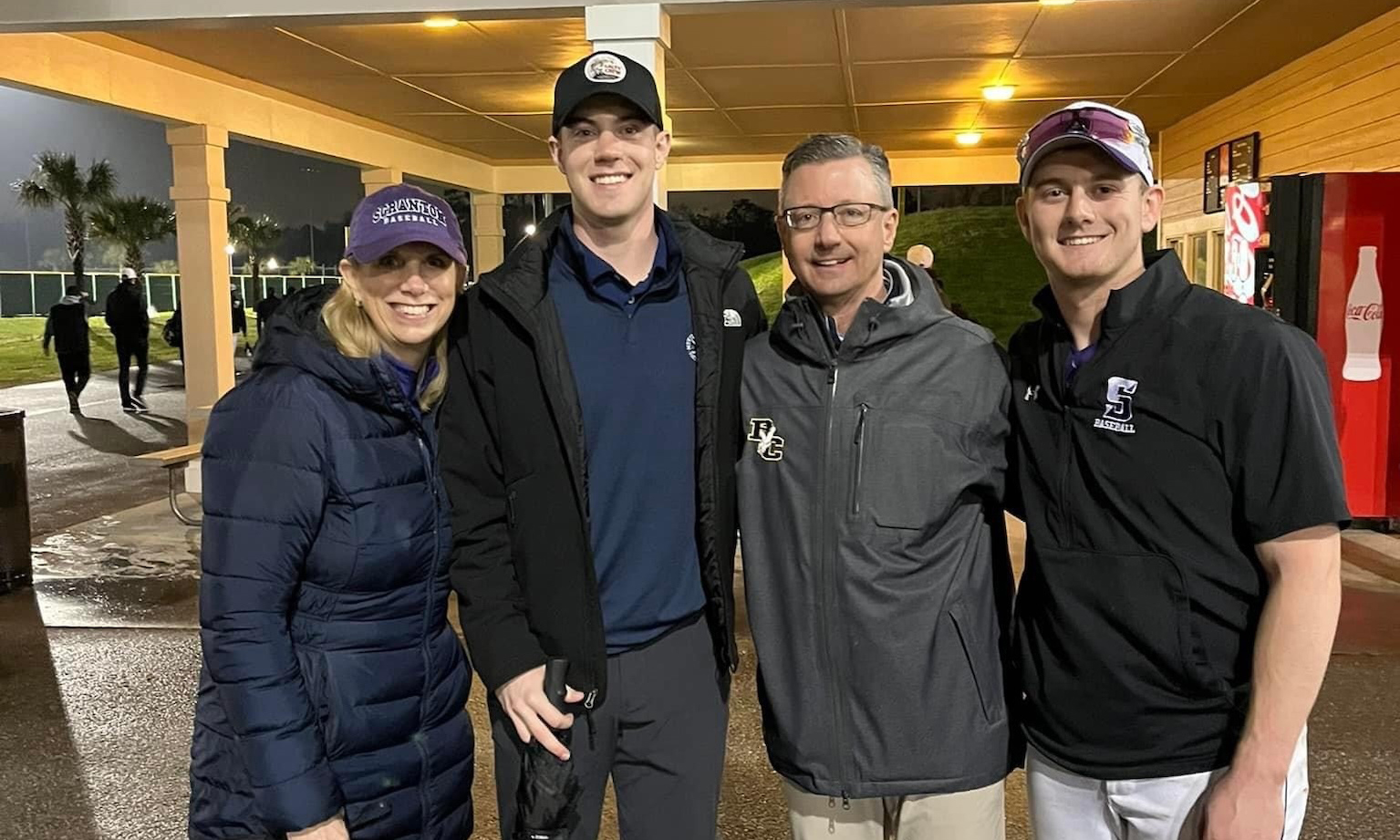 Brendan Douthit ‘24, shown here with mother, Beth, John ’90 and brother, Patrick.