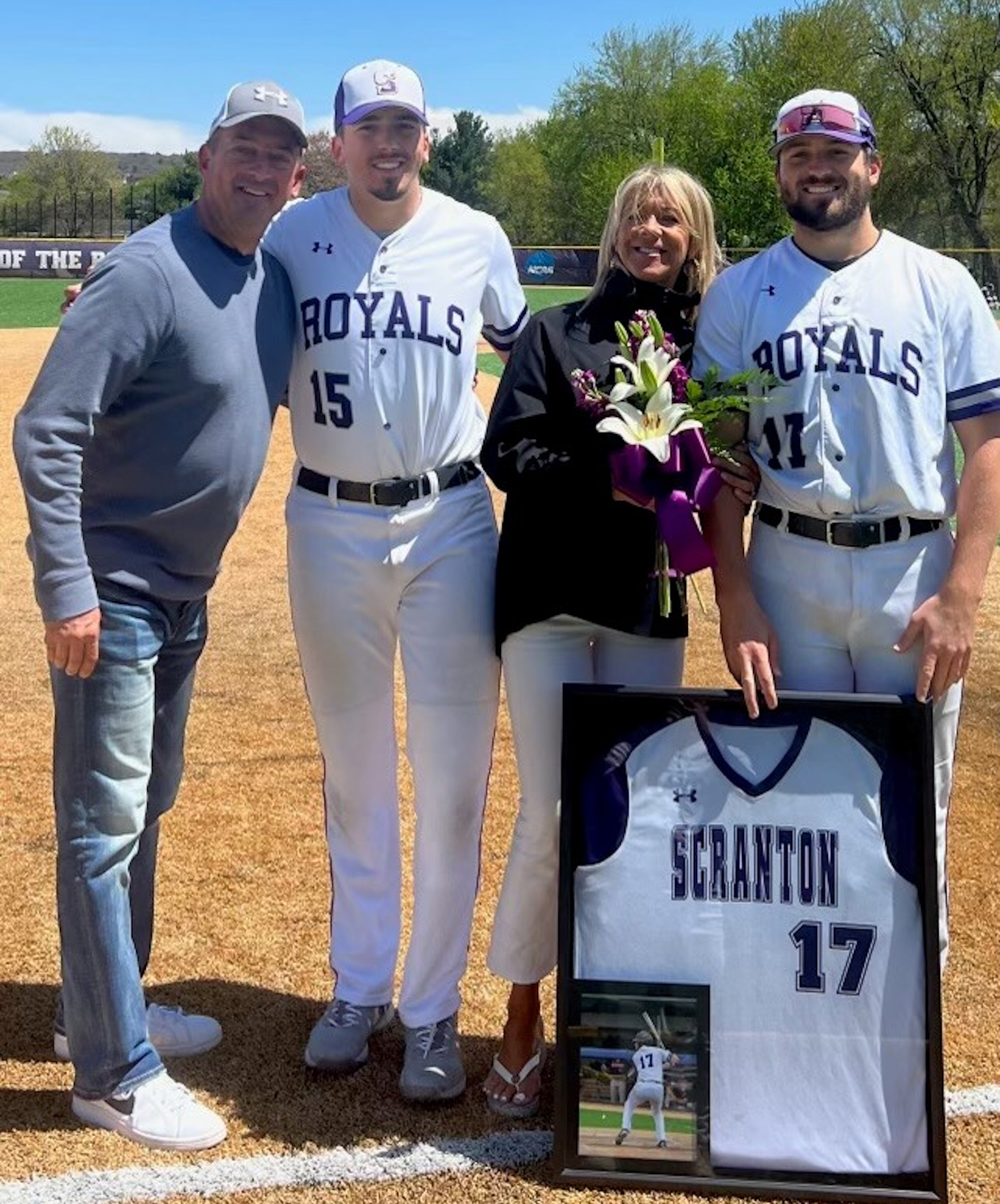 Joe Lisicky ‘24, with Jack ‘90, mother, Lisa, and Jake ’22.