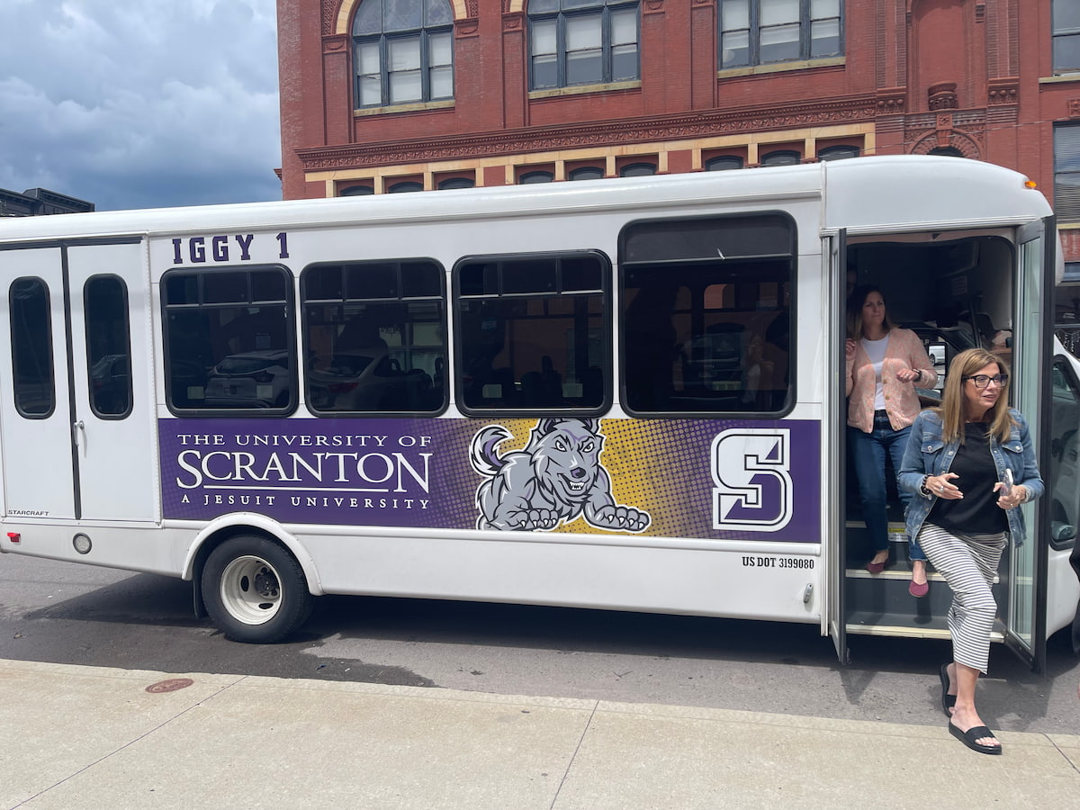 The Iggy Bus provides transportation for community partner site visits during the CBL Annual Faculty Workshop 2024.