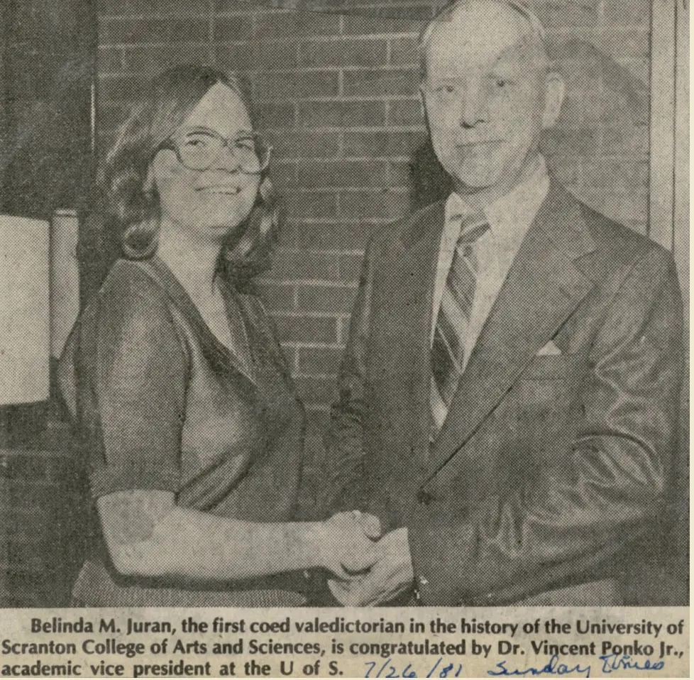 Belinda Juran receiving award