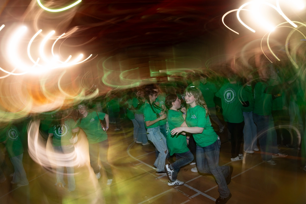 college alumni dancing at Shamrockin Eve party